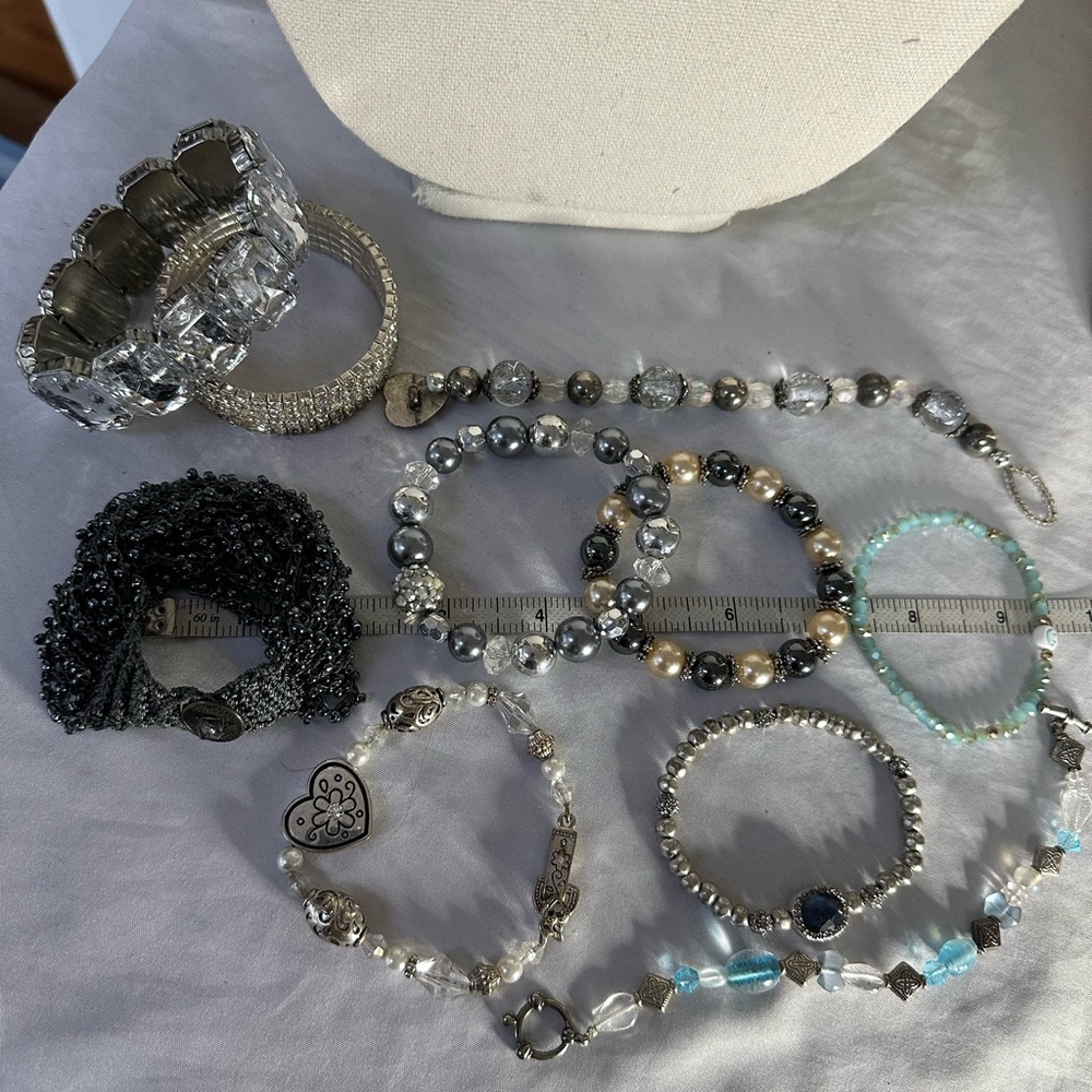 Large group of pearl bead and sparkly rhinestone bracelets